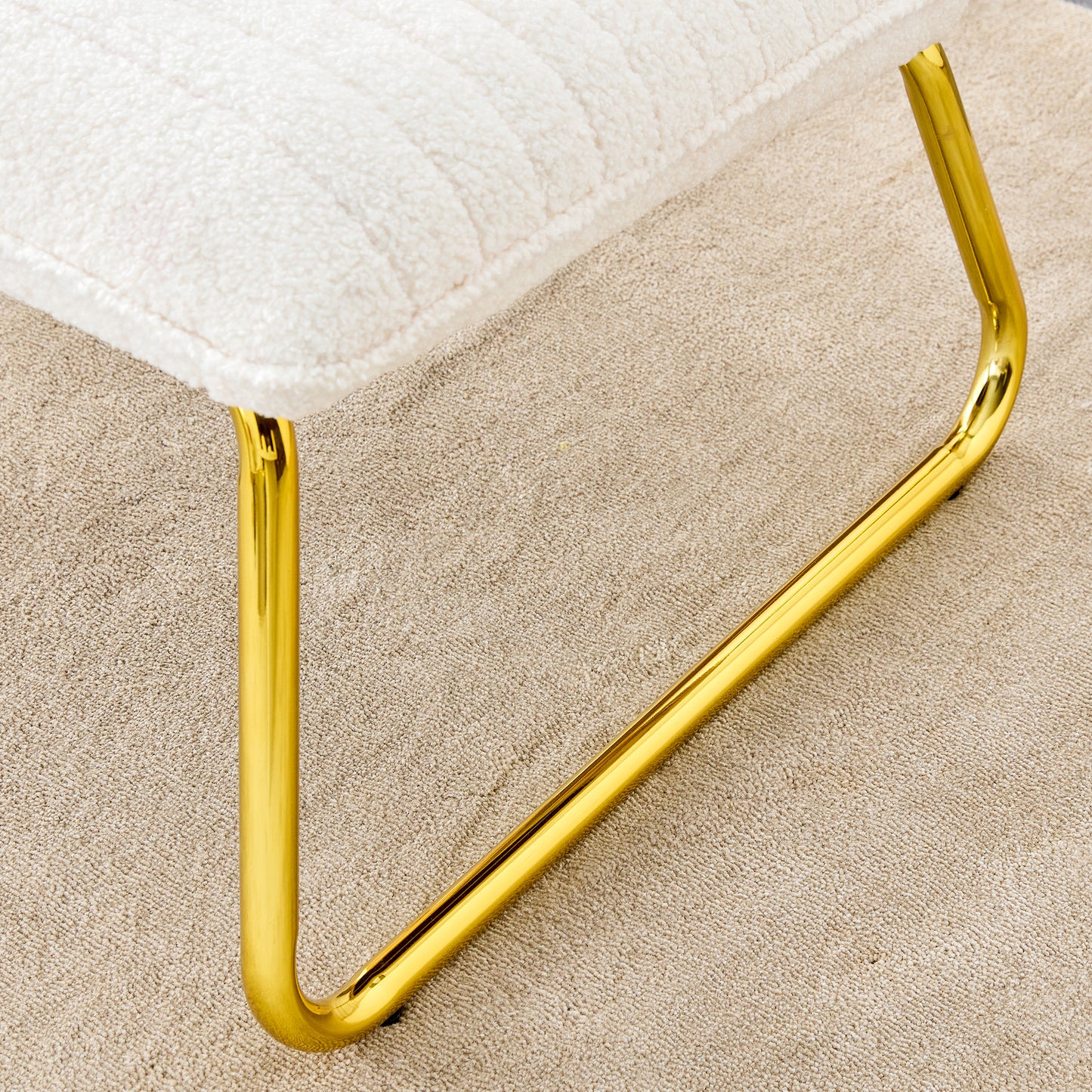 One White minimalist armless sofa chair with plush cushion and backrest paired with golden metal legs, suitable for offices, restaurants, kitchens, bedrooms